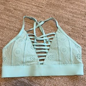 Turquoise Lorna Jane strappy sports bra